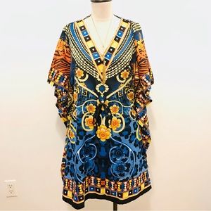 Laddi multicolor floral wrap up tunic. One size. Excellent used condition.